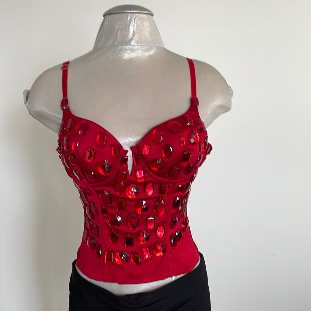 New with Tags! CELO bustier red with red stones lace up back. Fits Size from 0-8